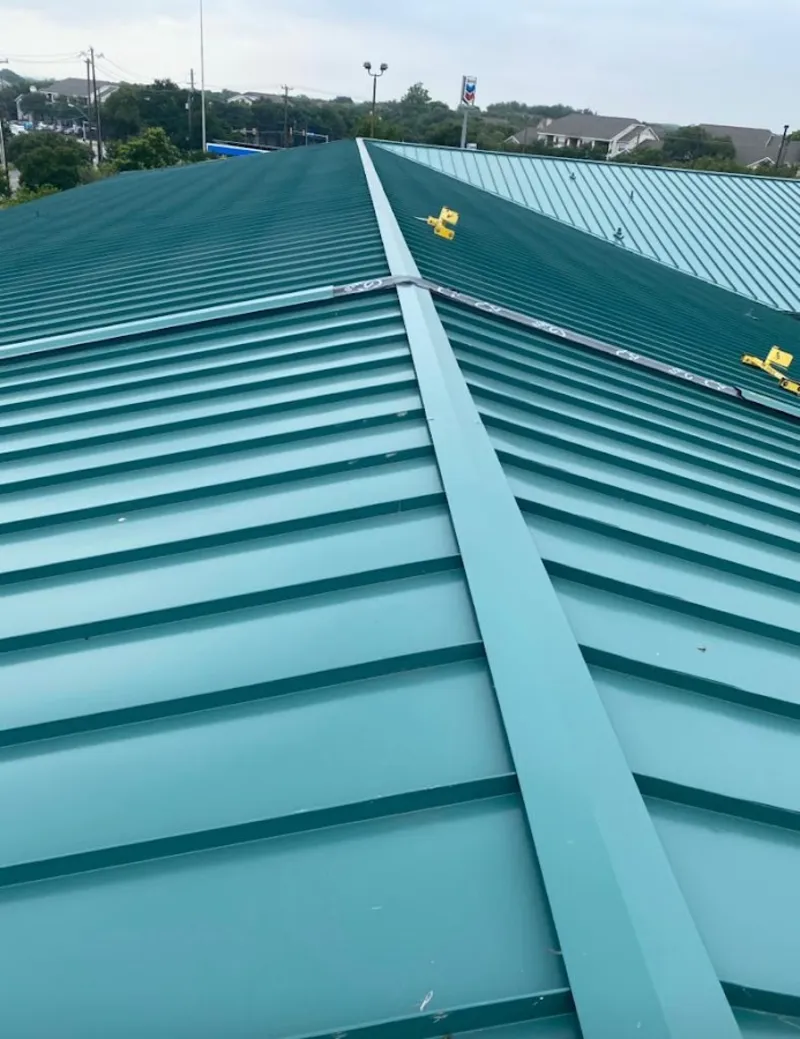 Green commercial metal roof ridge and valley for Metal Roof Repair in Brentwood